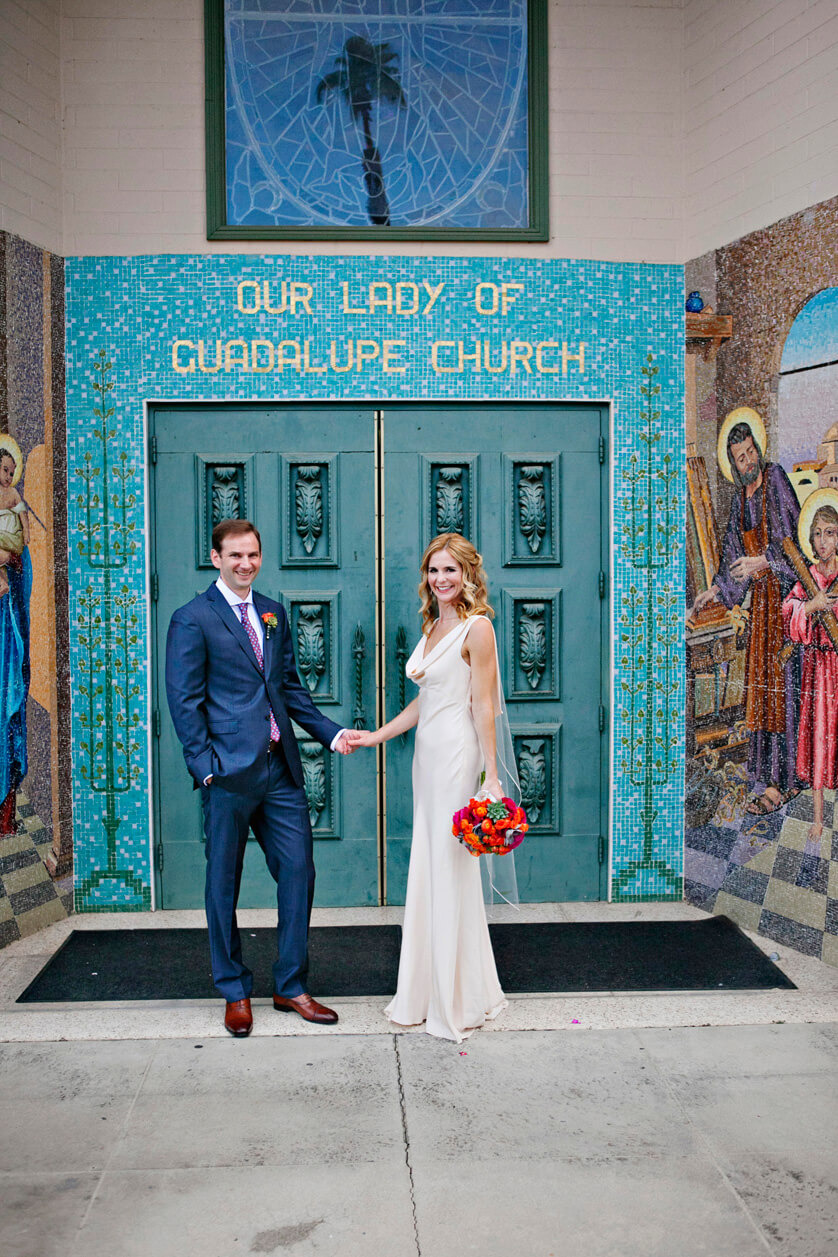 A portrait in front of the church doors