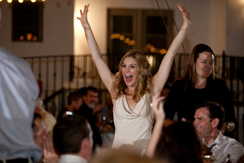 Bride celebrates as her college football team wins