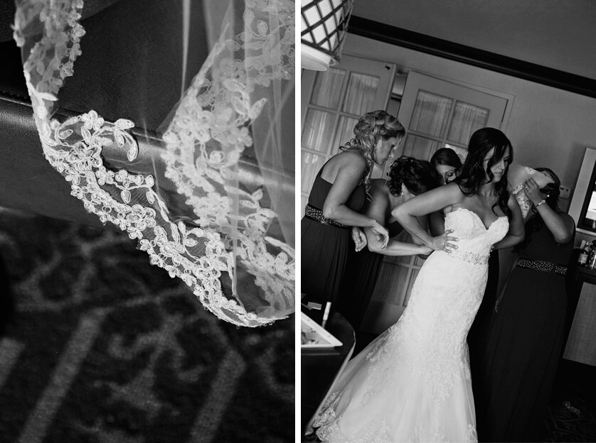 Bride putting on dress and veil detail