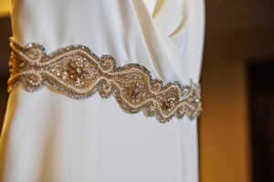 Beaded belt detail on wedding dress
