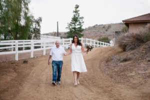 The brides dad walks his daughter to the ceremony site