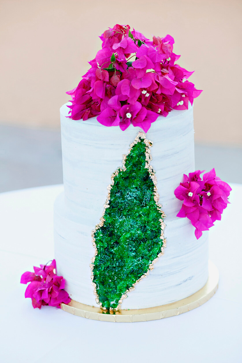 Custom wedding cake with green geode decor