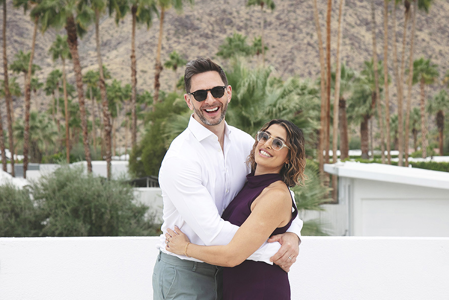 Adorable couple smiling happily for the camera 