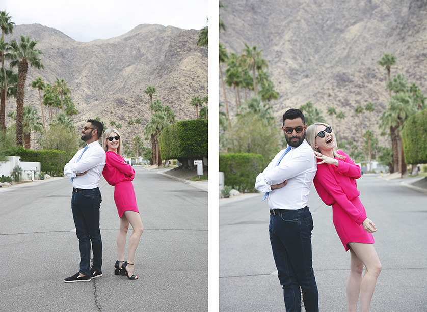 Couple pose for fun/candid portraits in front of dramatic mountain back drop.  