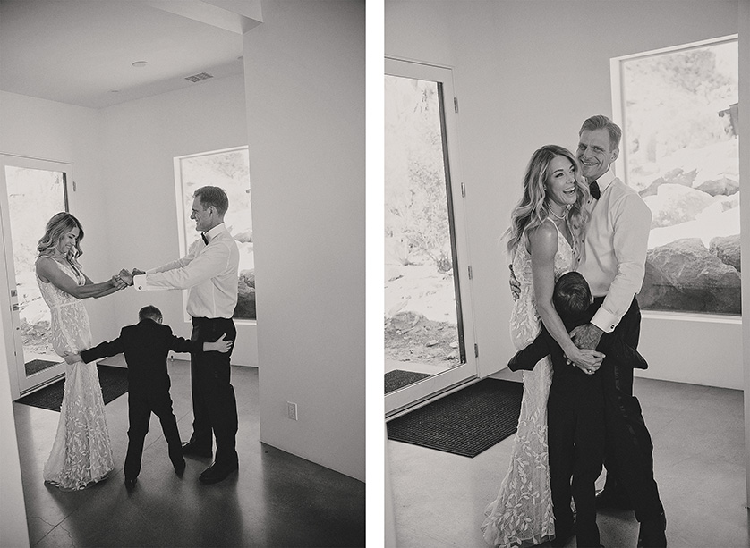 Joyful wedding moment with bride, groom, and child indoors