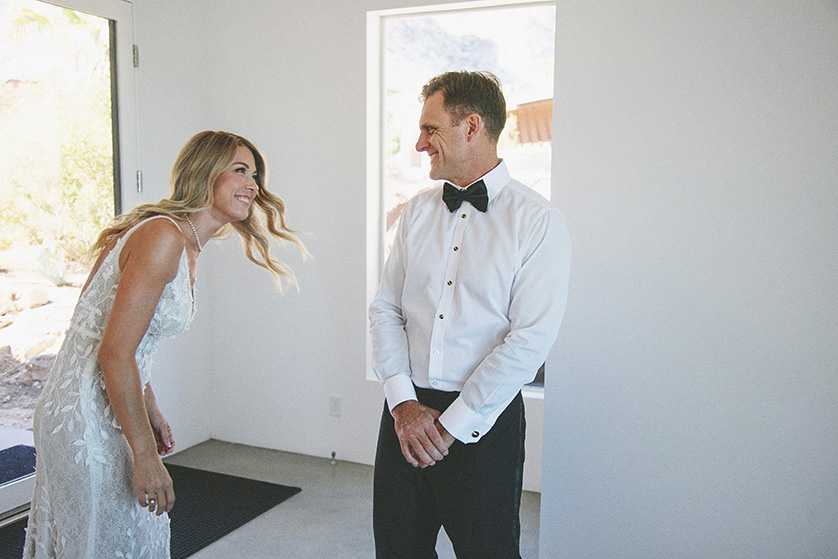 Groom sees his beautiful bride for the first time.