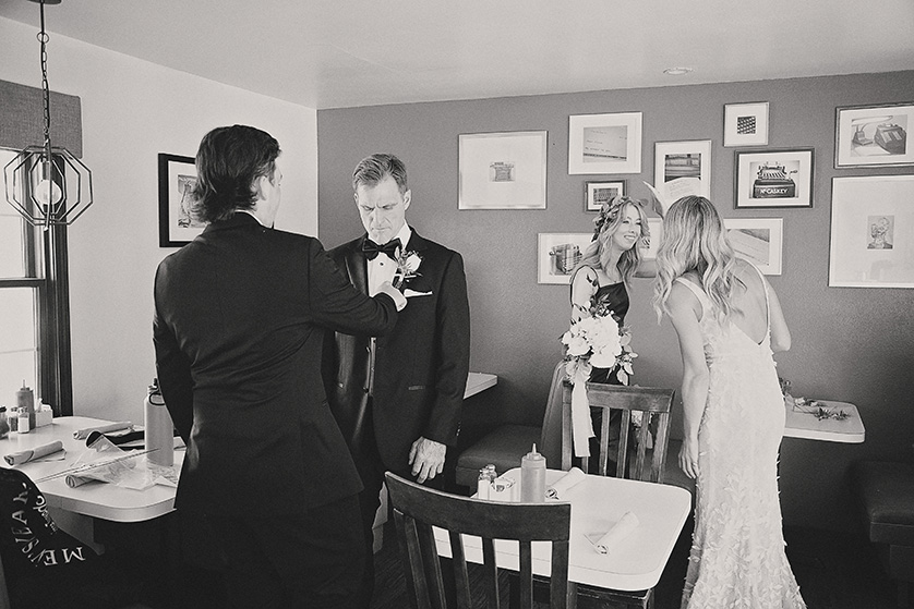 The couple wait in the nervously with their wedding party for their ceremony to begin