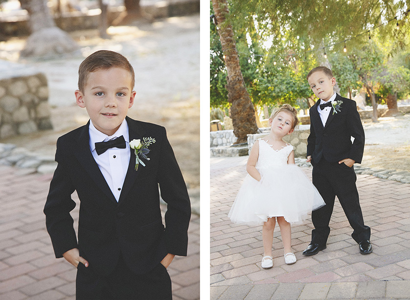 Cute ring bearer and flower girl ham it up for the camera.