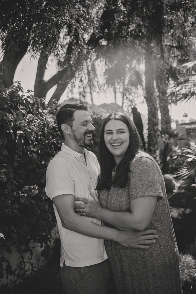 Lovely black and white portrait of couple in a beautiful garden