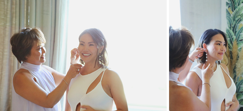 Bride's mom helps her with her earrings