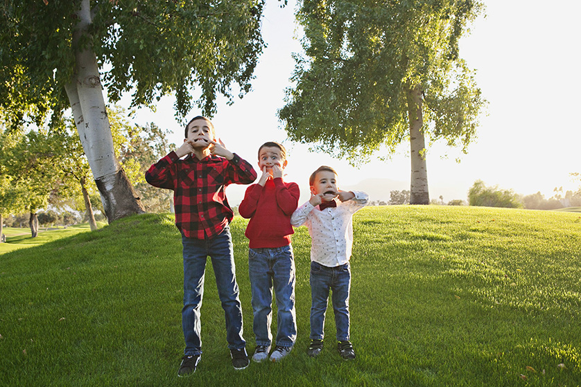 Three boys make silly faces