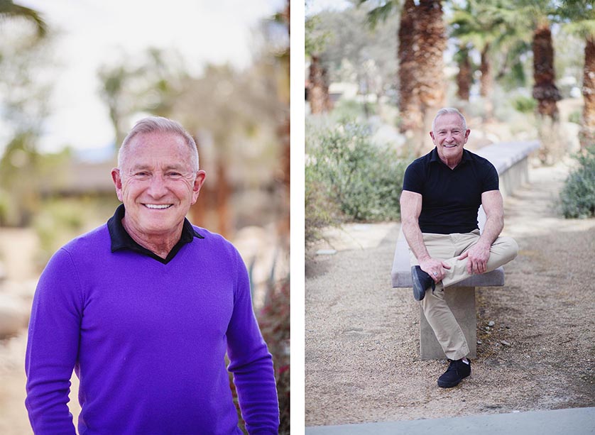 Older man in black shirt and purple sweater