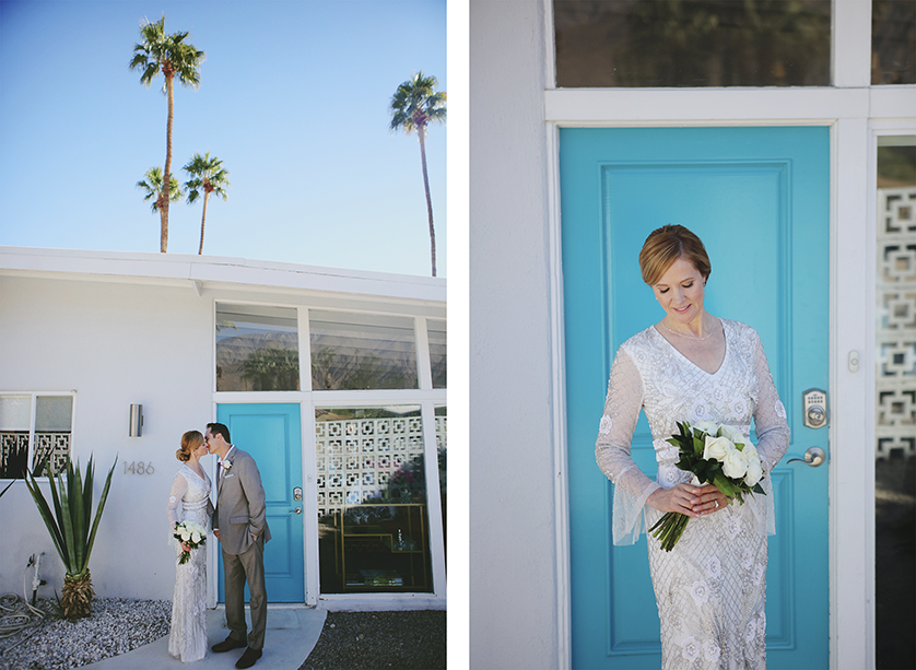 
Bride and groom share a kiss in front of a mid-century modern Palm Springs home with a turquoise door.
