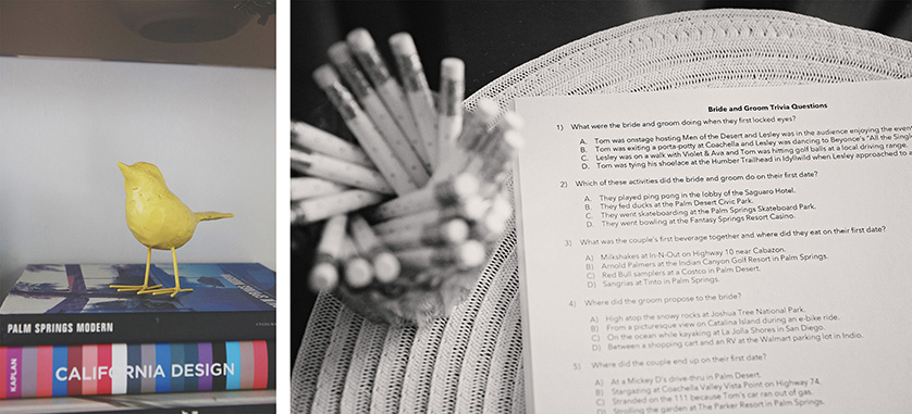 Close-up of wedding decor and guest activity: design books with a yellow bird sculpture and a trivia quiz about the couple.