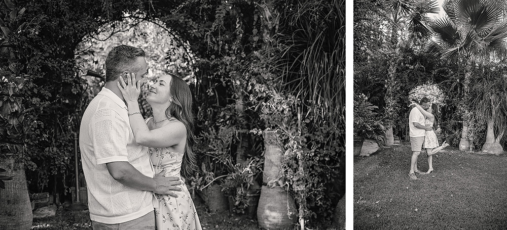 A newly engaged couple embraces under a lush garden archway at Casa de Monte Vista in Palm Springs during their surprise proposal.
A couple kisses on the lawn surrounded by palm trees and greenery at Casa de Monte Vista in Palm Springs after their engagement.