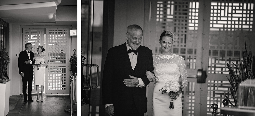 Bride standing with her father just before walking down the aisle at an intimate wedding at Skylark Hotel, captured in black and white documentary wedding photography