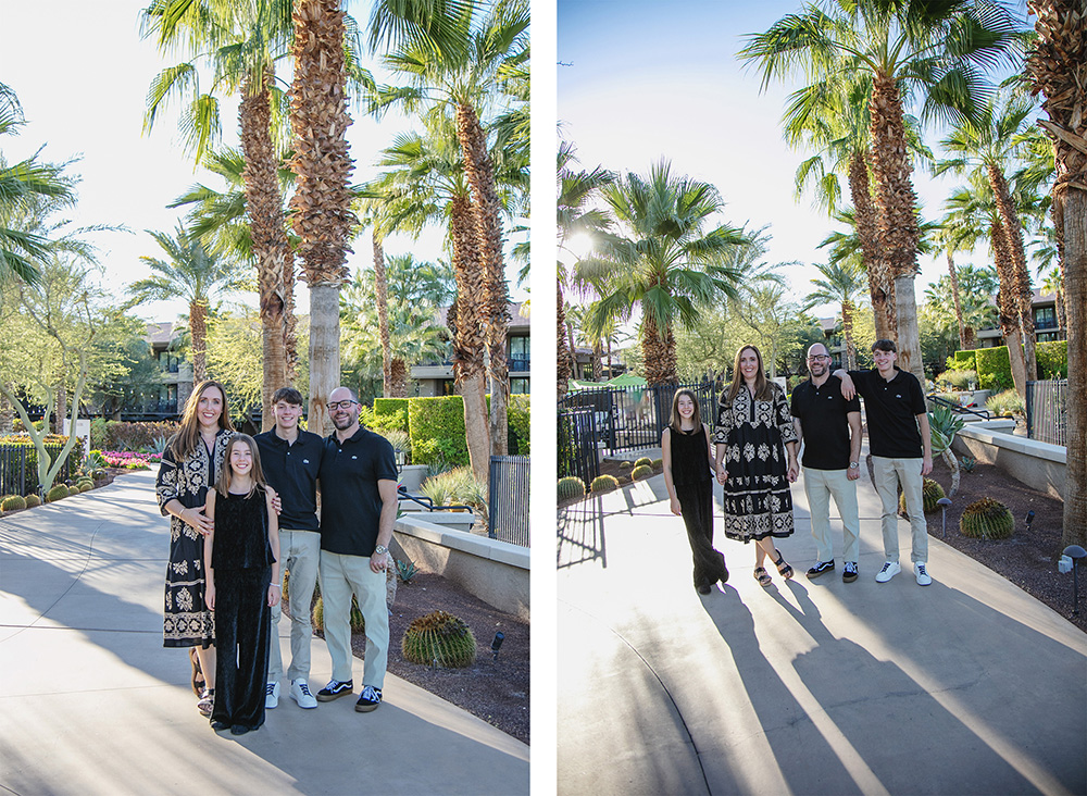 Family of four pose amongst tall palm trees, surrounded by luminous afternoon sunlight