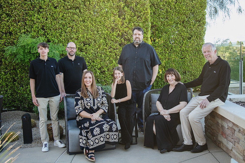 A generational photo including grandparents, grown kids and grandkids