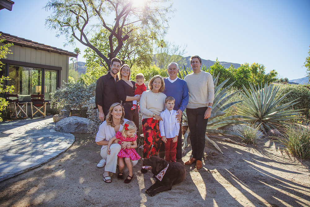 Multi-generation family portrait outdoors with children and family dog during a Palm Springs family photography session.