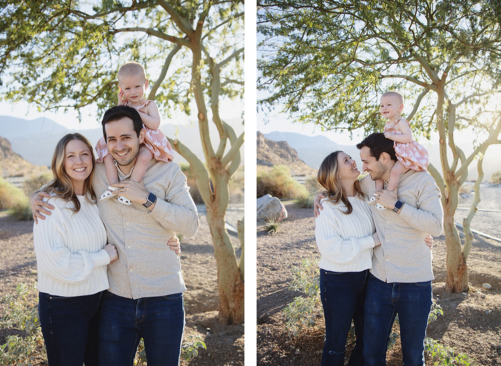 Family of three standing together in La Quinta Cove desert light with toddler sitting on dad’s shoulders