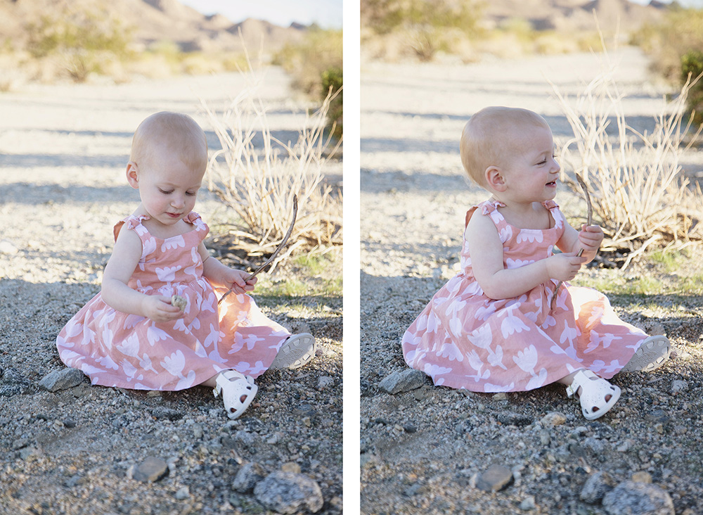 Toddler sitting in desert sand playing during La Quinta family photo session