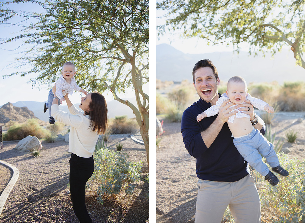 Parents playing with their baby during a La Quinta Cove family photo session, lifting and holding him in the desert with mountain views in soft afternoon light.