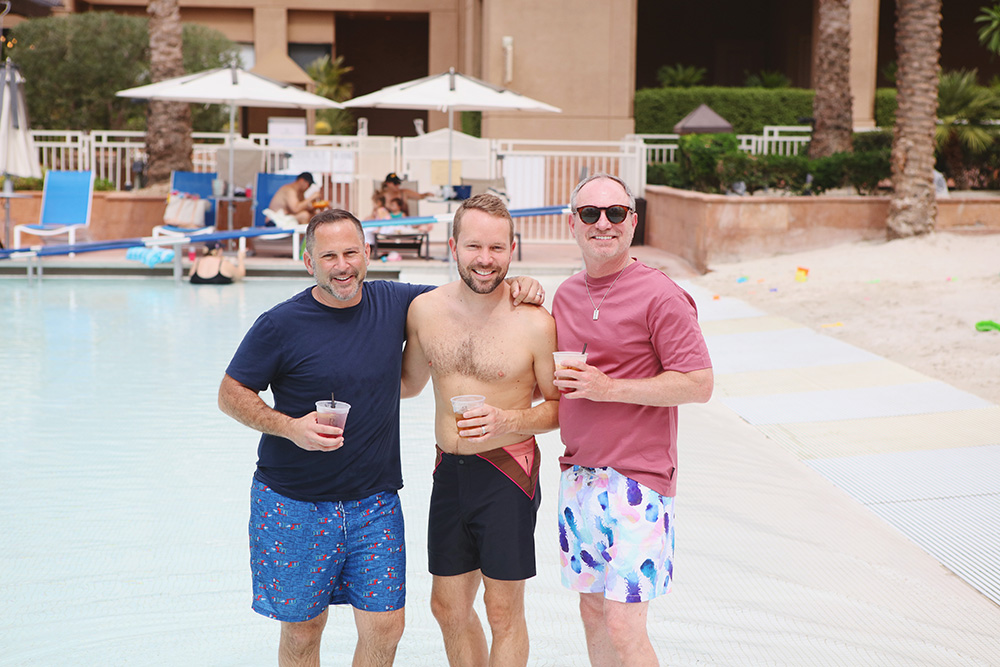 Candid of three guests in the pool