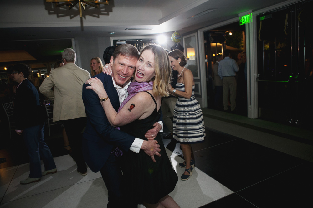 Guests having fun at a dance in a hotel ballroom