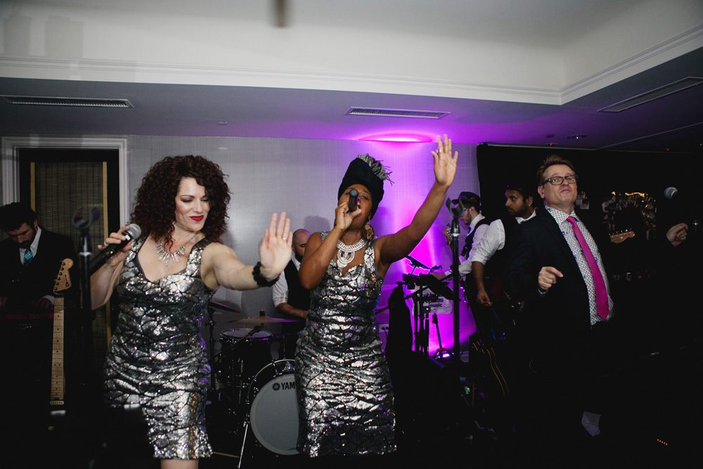 Band featuring two stylish lead singers dancing