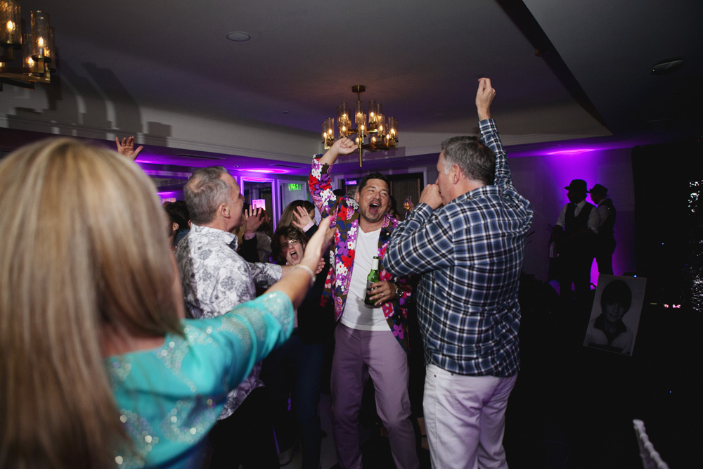 Birthday celebrant enjoys dancing on the dance floor with friends