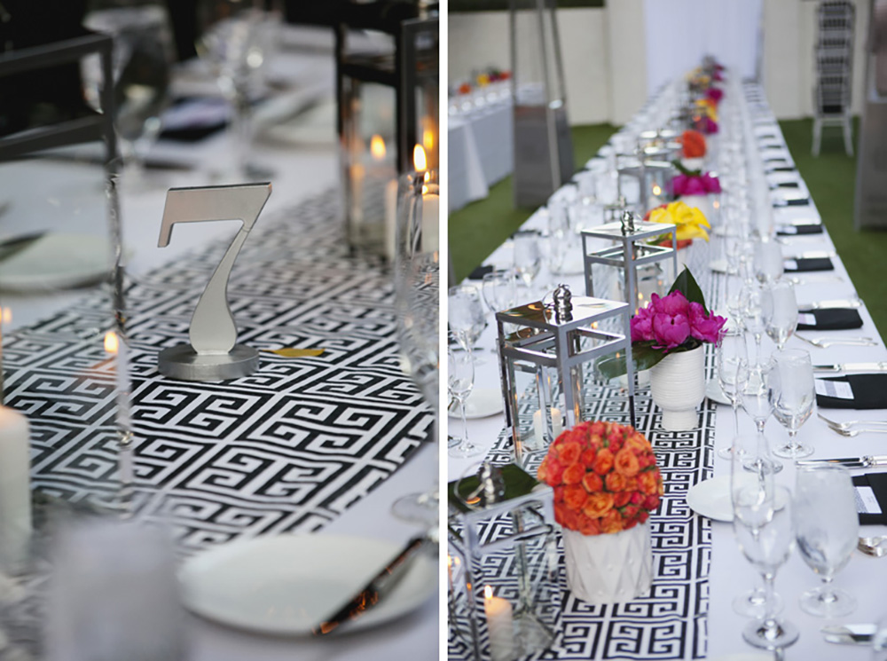 Long family style wedding dinner tables with vibrant decor