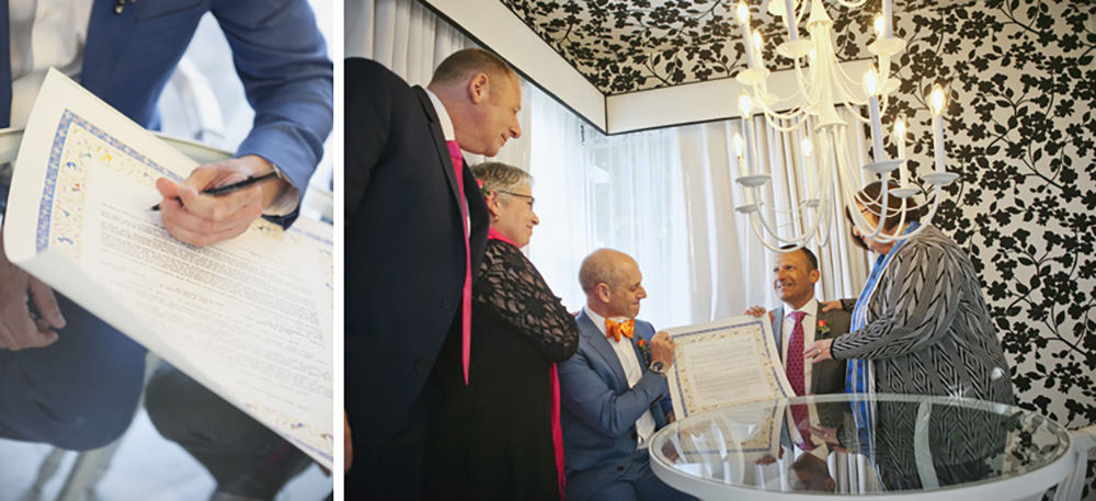 Same sex couple sign the ketubah and celebrate with friends